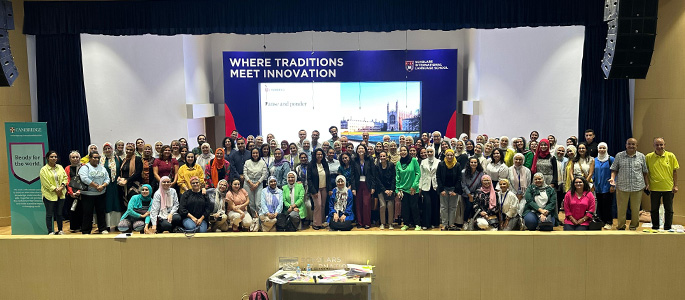 Orientation participants onstage for a group photo