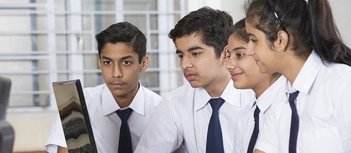 Students learning computer programming