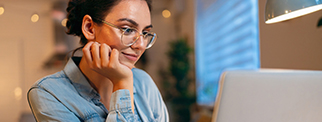 Woman browsing her laptop