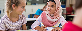 Muslim girl with her classmate