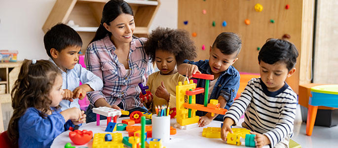 A teacher with young students